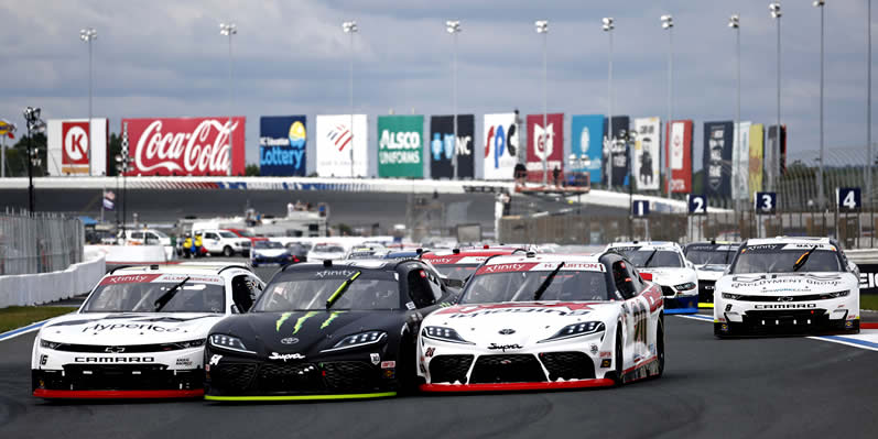 AJ Allmendinger, Ty Gibbs and Harrison Burton race