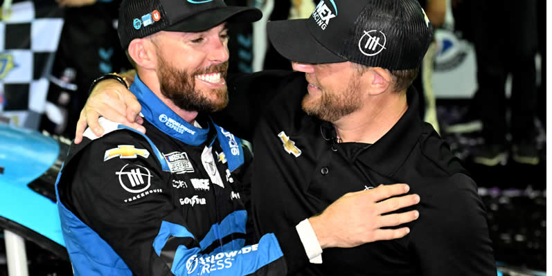 Ross Chastain is congratulated by Justin Marks in victory lane