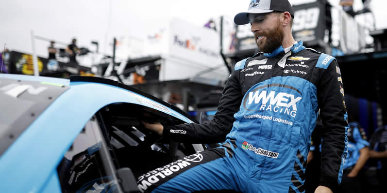 Ross Chastain enters his car during practice