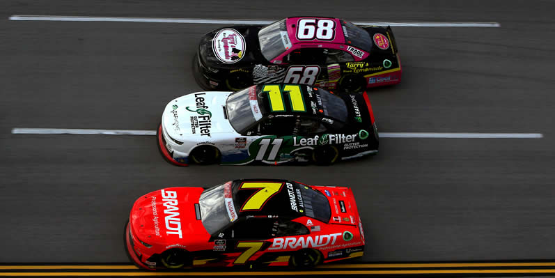 Justin Allgaier, Justin Haley and Brandon Brown race