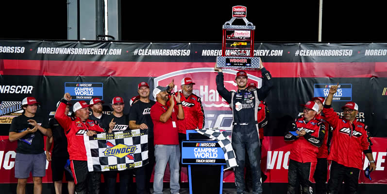 Todd Gilliland hoists the trophy