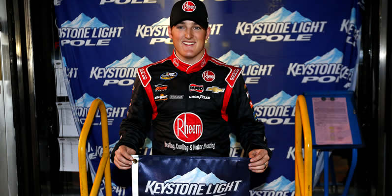 Ty Dillon poses after qualifying for pole position