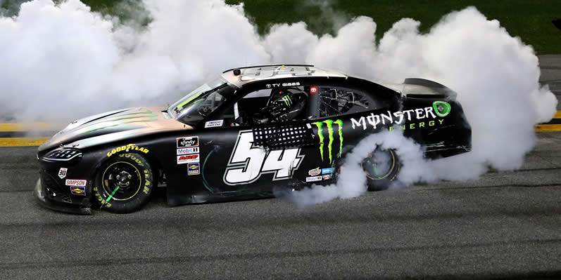 Ty Gibbs celebrates with a burnout