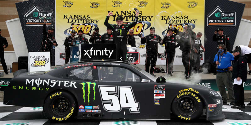 Ty Gibbs celebrates in victory lane at Kansas Speedway