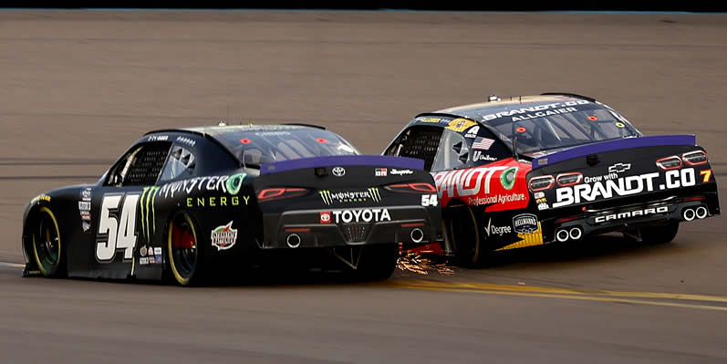 Ty Gibbs drives with sparks against Justin Allgaier