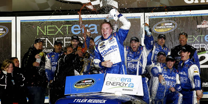 Tyler Reddick celebrates in victory lane