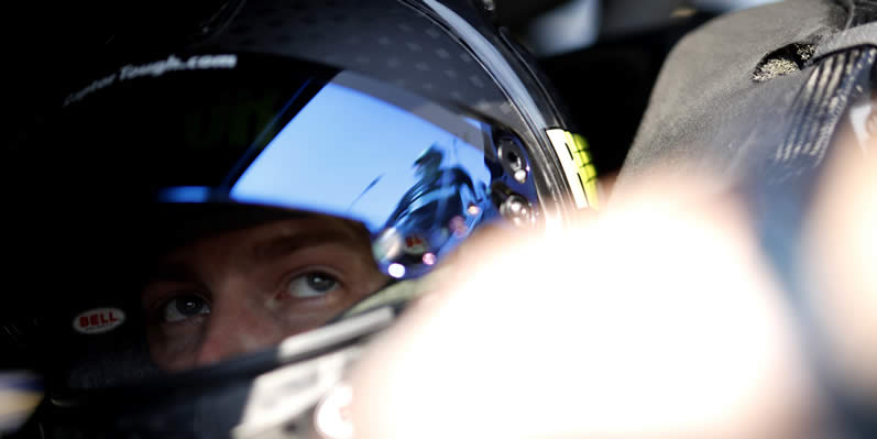 William Byron sits in his car during qualifying